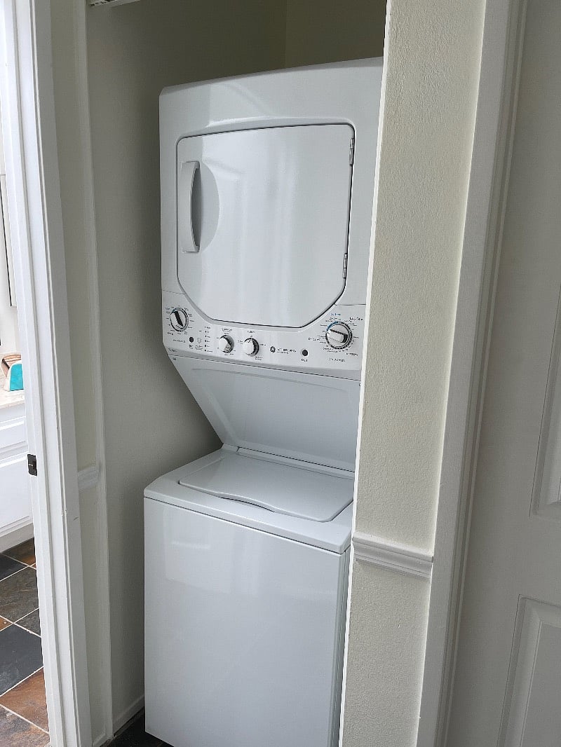 In-unit washer and dryer in hallway