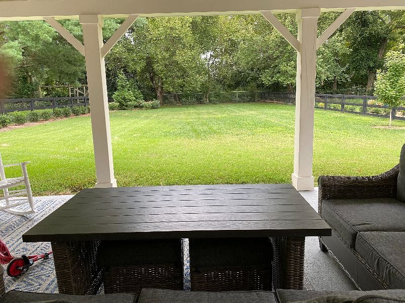 The back yard is perfect to rela