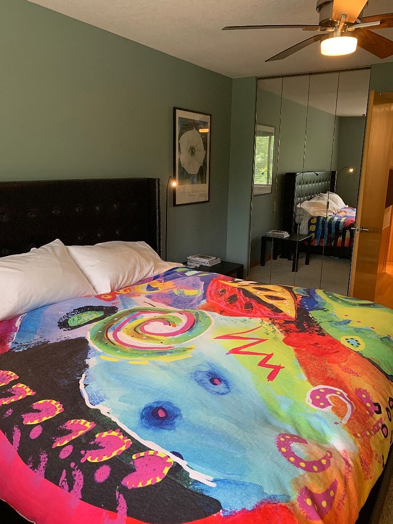 Well appointed bedroom with a full size closet organizer