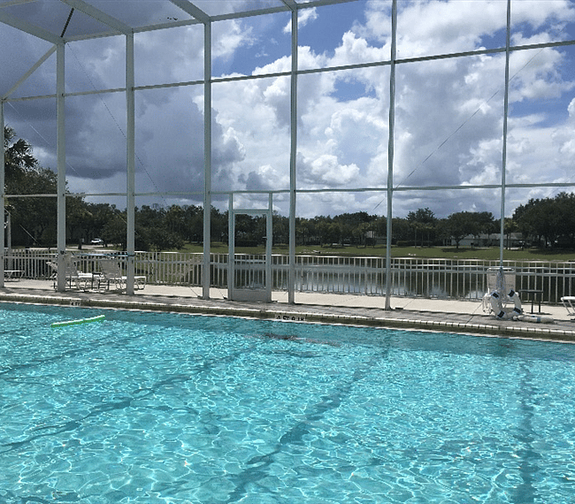 Screened in pool. Long enough to do laps. Deepest part is around 5 feet, but also family friendly walk in area. Heated from Oct to April, but who really needs it heated? Youre in Florida!
