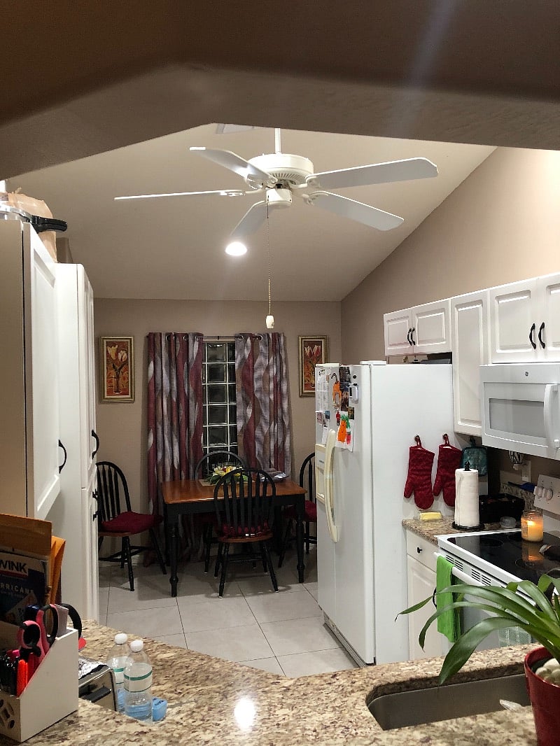 Looking into kitchen from the countertop in living room.
