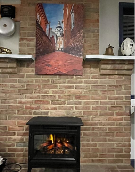 Faux fireplace with supplemental heat if needed