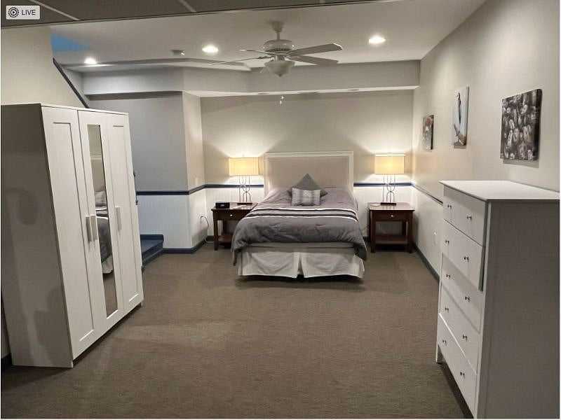 Bedroom Area, Full size bed with 2 night stands and lights, Full size dresser and Wardrobe closet. 