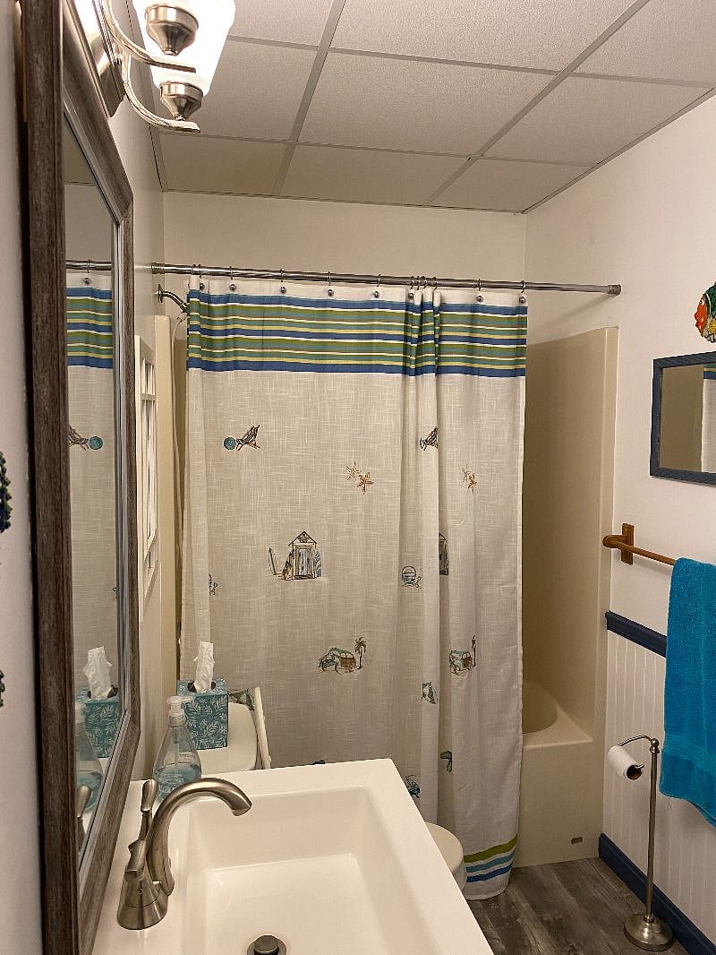 Full size private bath with tub.