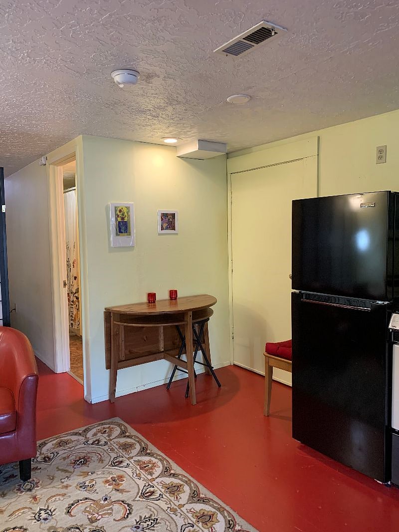 The table extends to accommodate a guest for dinner.