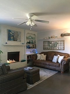 Den with fireplace and tv