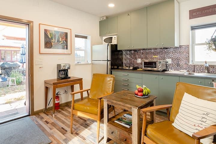 Kitchen area with full fridge, Large toaster oven and double burner hot plate