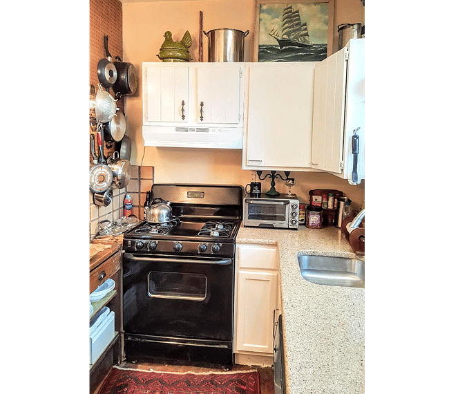 Kitchen with exclusive use cabinets and diningware, disposal, & supplies