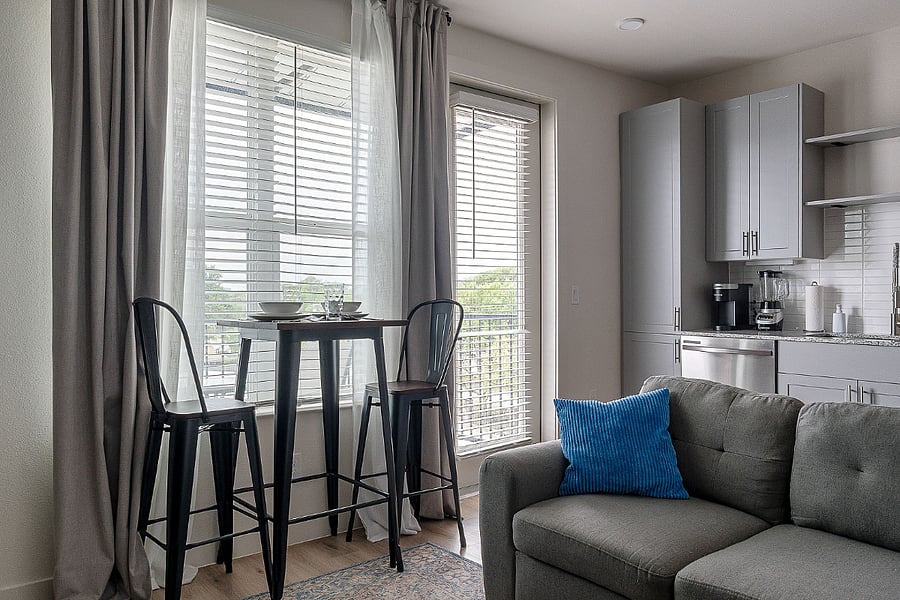 Bright Living Area with Balcony Access