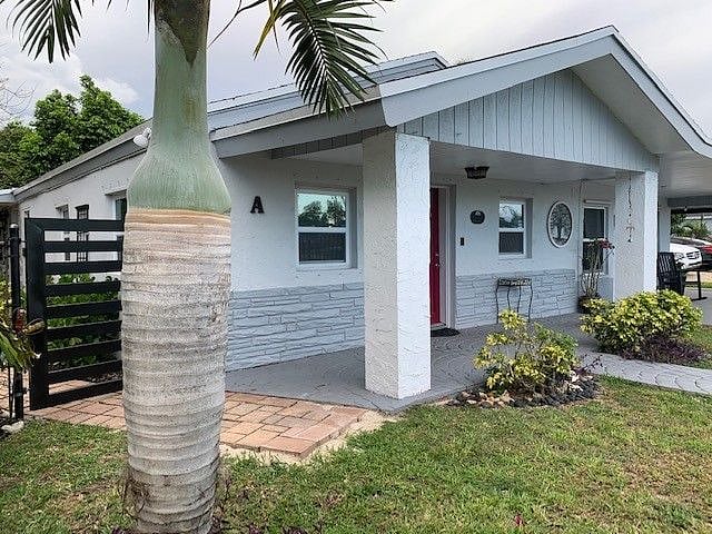 Strong concrete block structure with new roof and impact resistant windows for hurricane safety!