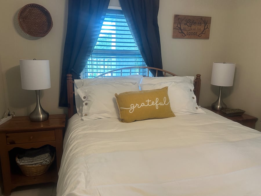 Queen size bed with memory foam mattress pad