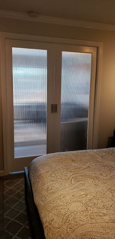 Pocket doors with privacy glass