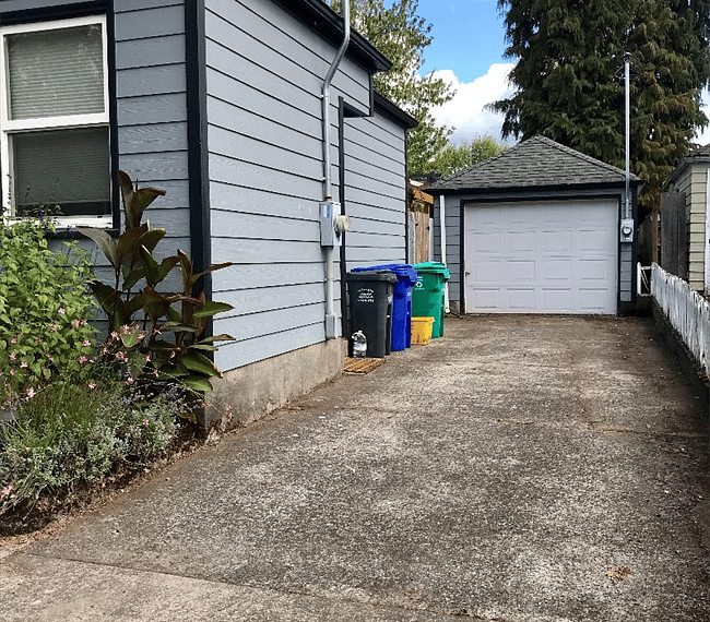 Driveway will easily hold two cars. Garage is not available for tenant use.