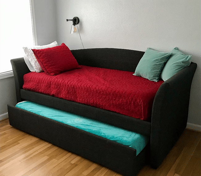 The second bedroom features a twin with a twin trundle, as well as a closet with built-in shelving.