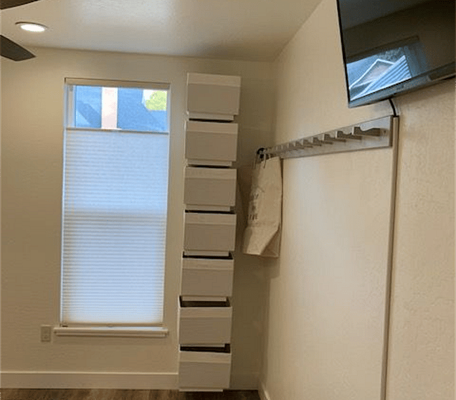 Settle in and watch a movie on the flat screen TV