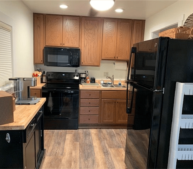 Fully stocked kitchen with updated appliances