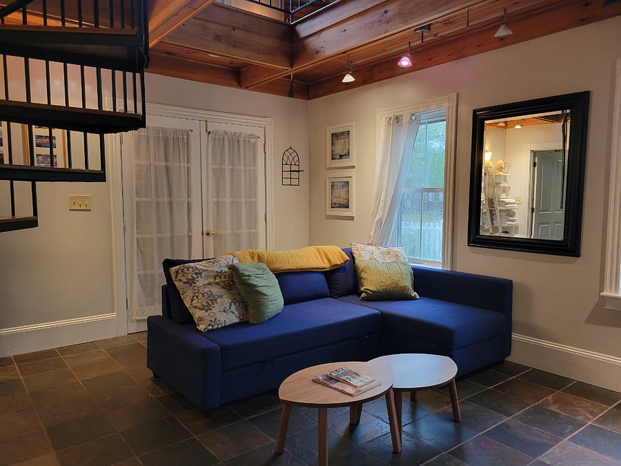 Living area & new convertible sofa from main entrance.