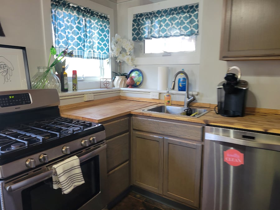 Stove, sink & windows.