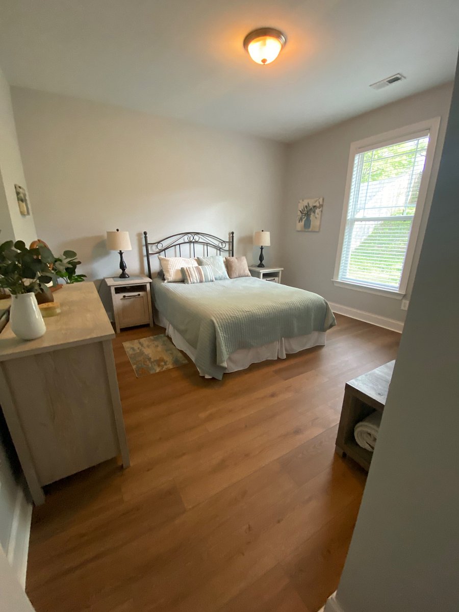 Bedroom 2 with full bed, dresser and closet