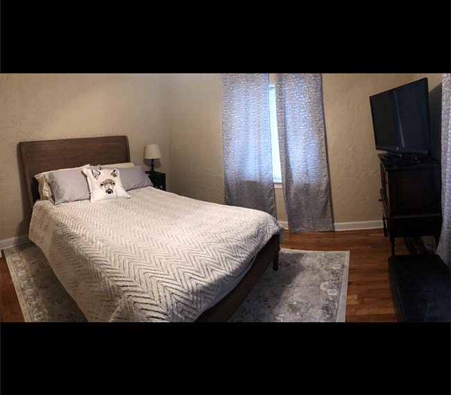 Soft linens and windows with blinds+curtains make a nice, dark sleeping environment!