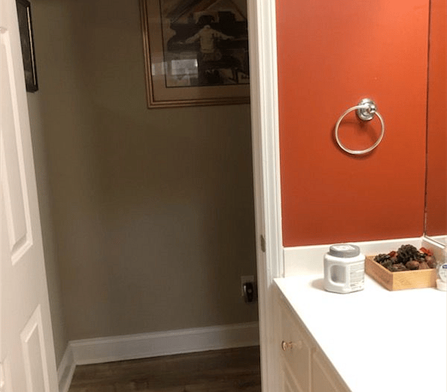 The bathroom is modern and stylish with shower, toilet and vanity