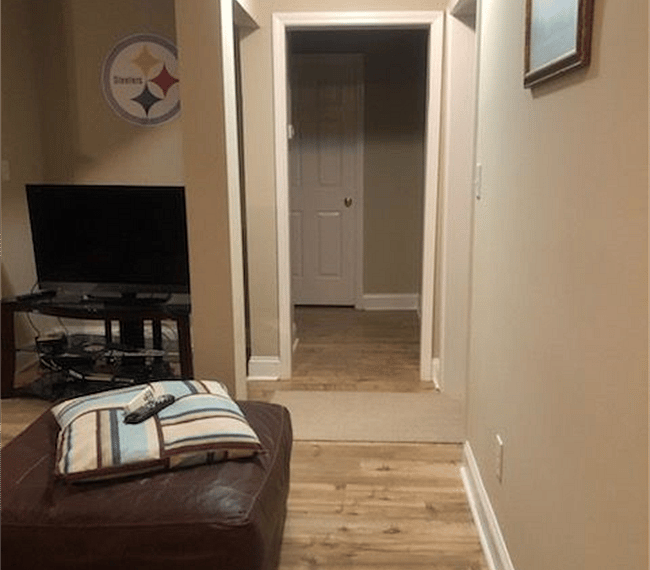 Settle in and watch a movie on the flat screen TV