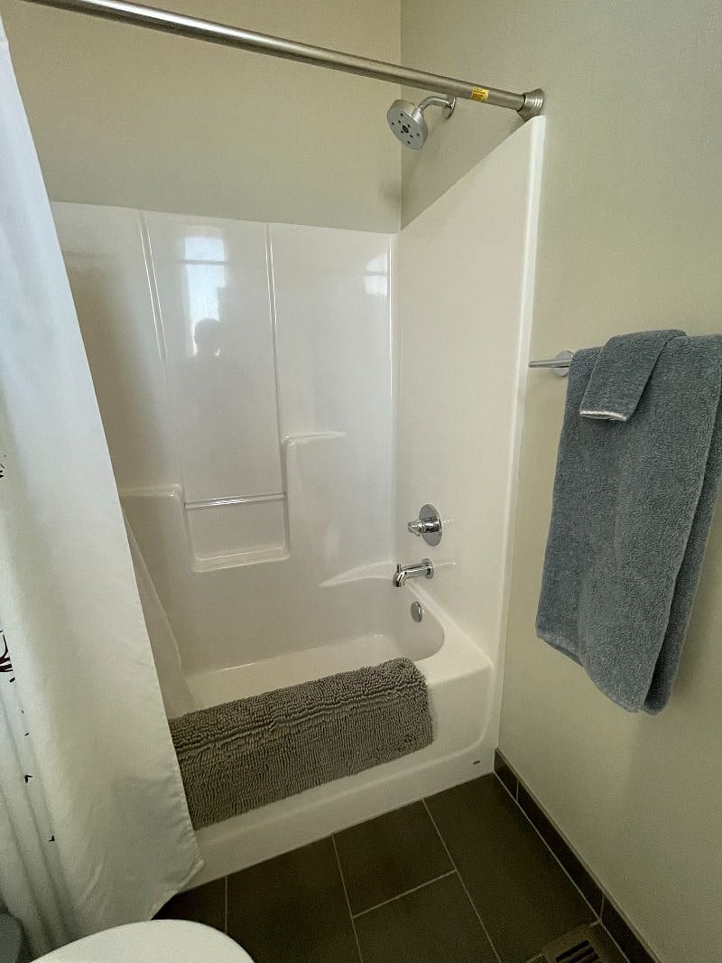 En-suite bathroom with shower.