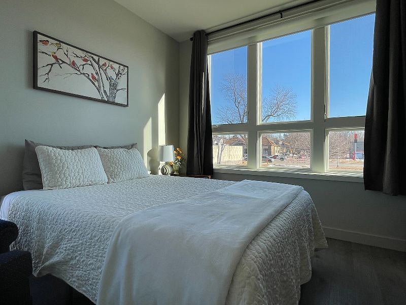 Big windows with blackout curtains.
