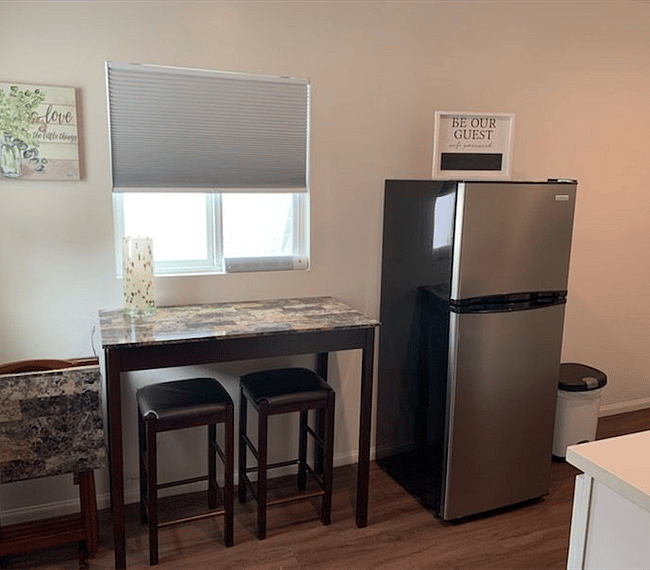 Kitchen bar and full size fridge