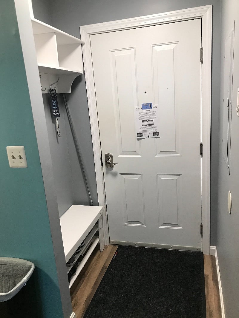 Entryway door with bench and jacket rack