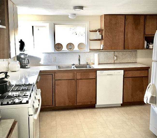 Kitchen has great windows above sink and view of the hills