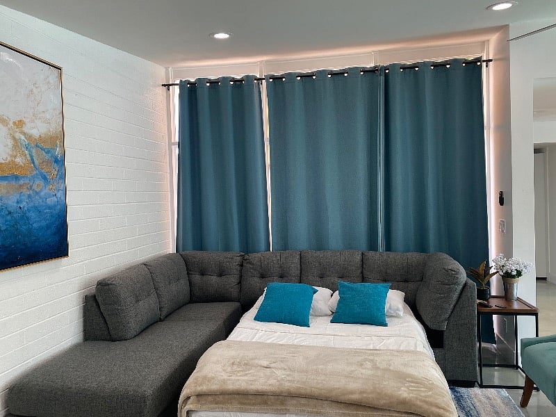 Sectional sofa with full sleeper