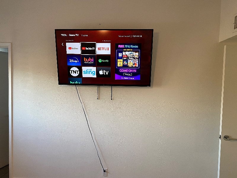 55 inch ROKU Smart TV in Master Bedroom