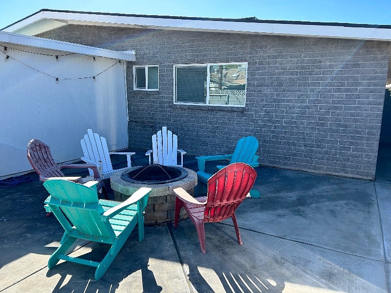 Adirondack chairs in the backyard. 