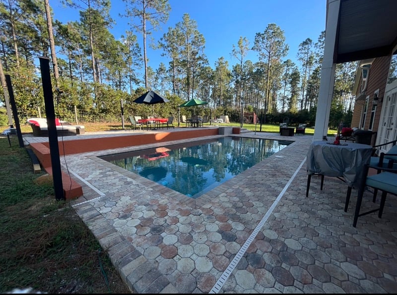 Shared pool area and grill with propane and small fire pit.
Towels and loungers provided in room.