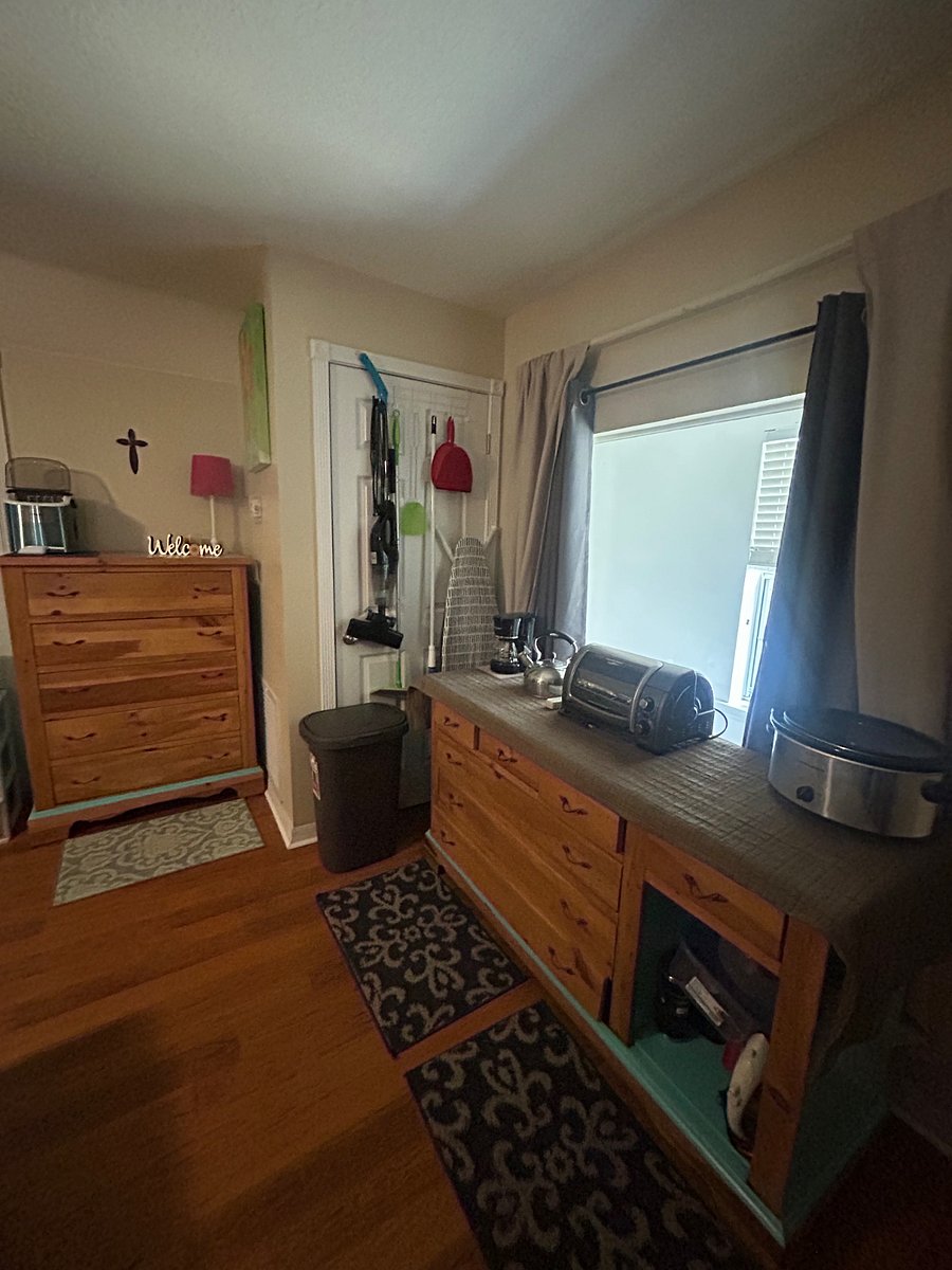 Kitchen area with everything you need to make a meal.
Tall Dresser for your clothes.