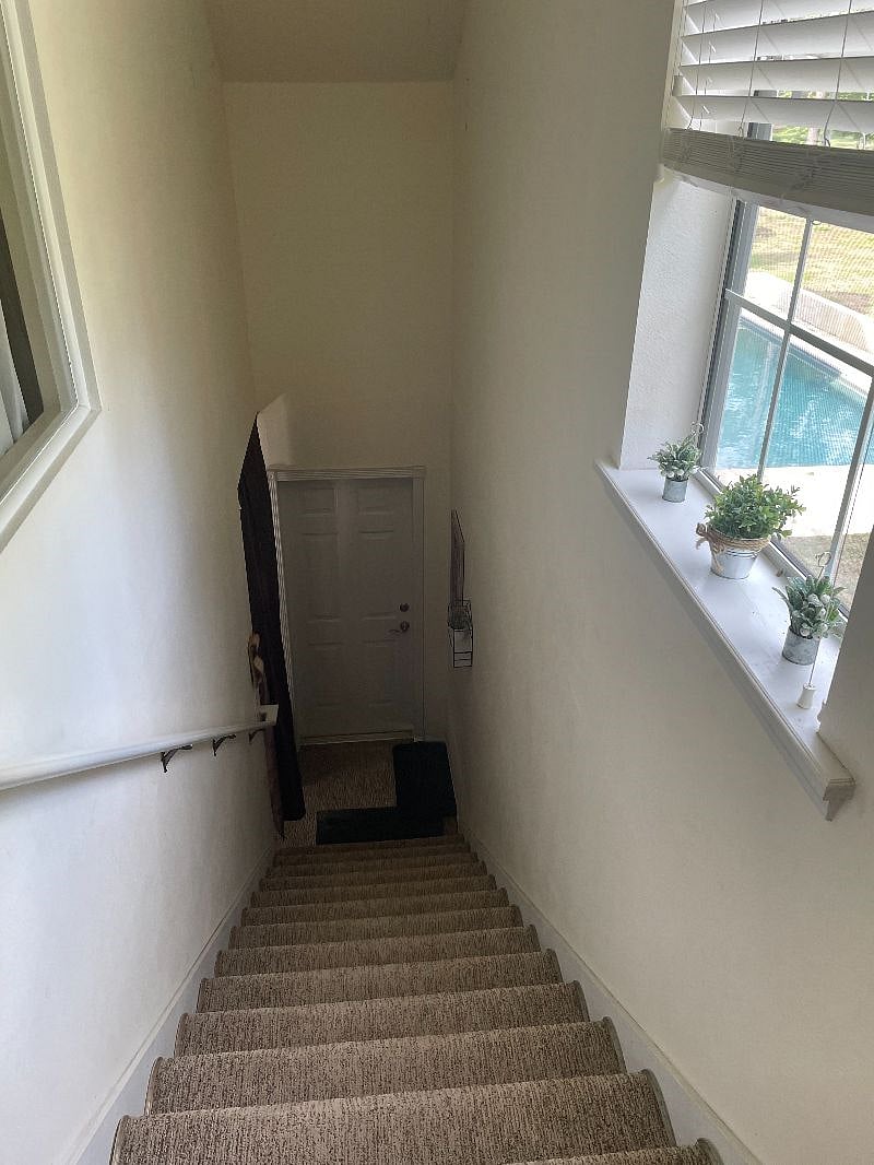 Private entrance door from top of stairs to private room