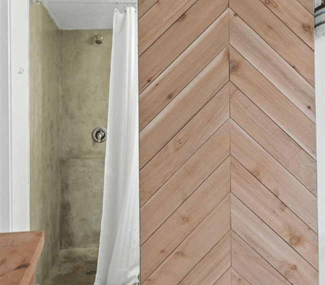 Barn door grants access to the bathroom