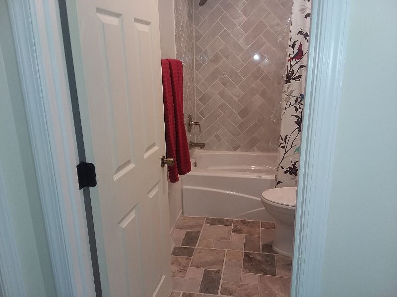 Tiled Bathtub in Newly Remodeled Upstairs Full Bath
