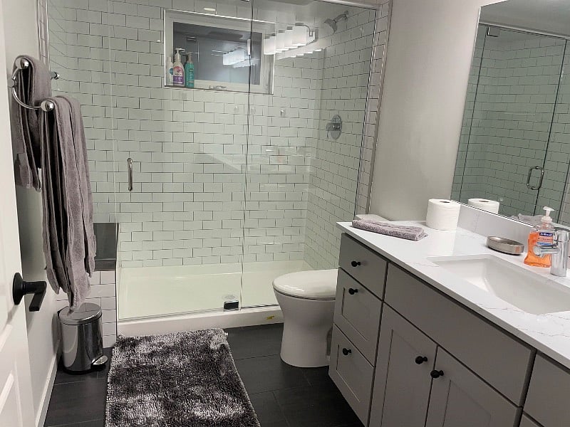 Large bathroom counter, shower & mirror space with ample storage. Heated floors.