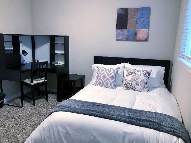Bedroom 2 - full size bed, corner desk and large closet