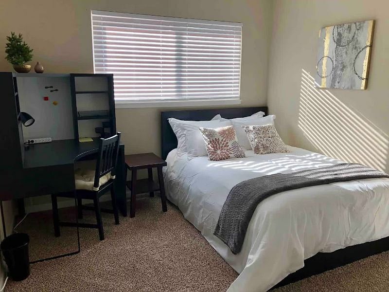 Bedroom 1 - full size bed, corner desk and large closet