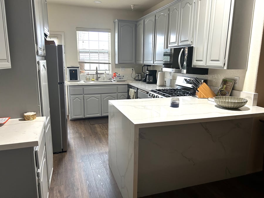 New countertops, floor, and appliances.