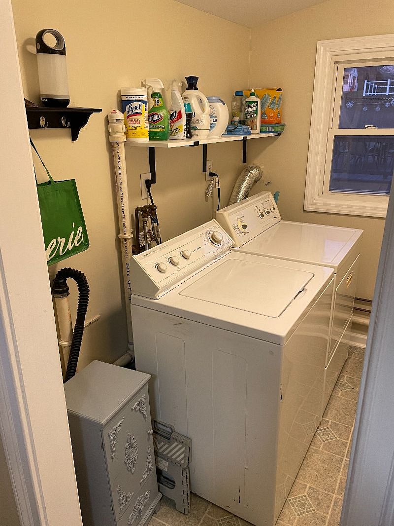 Laundry room with washer and dryer