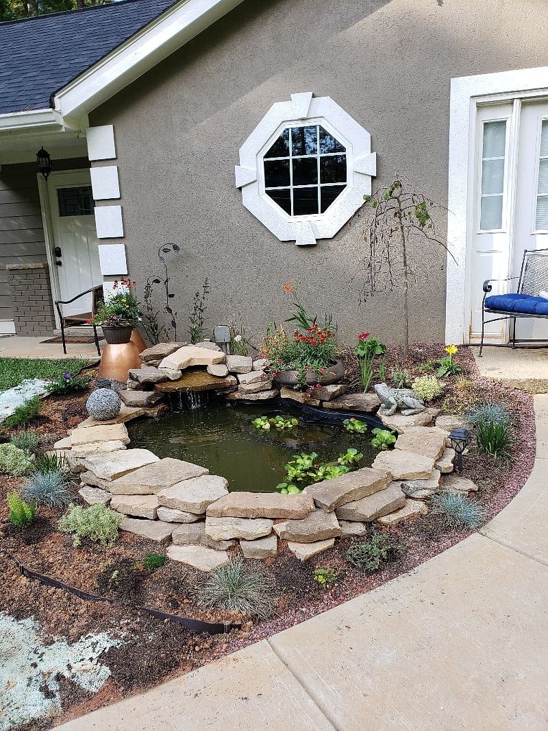 Fish pond with water feature just outside the cottage,  more relaxing!