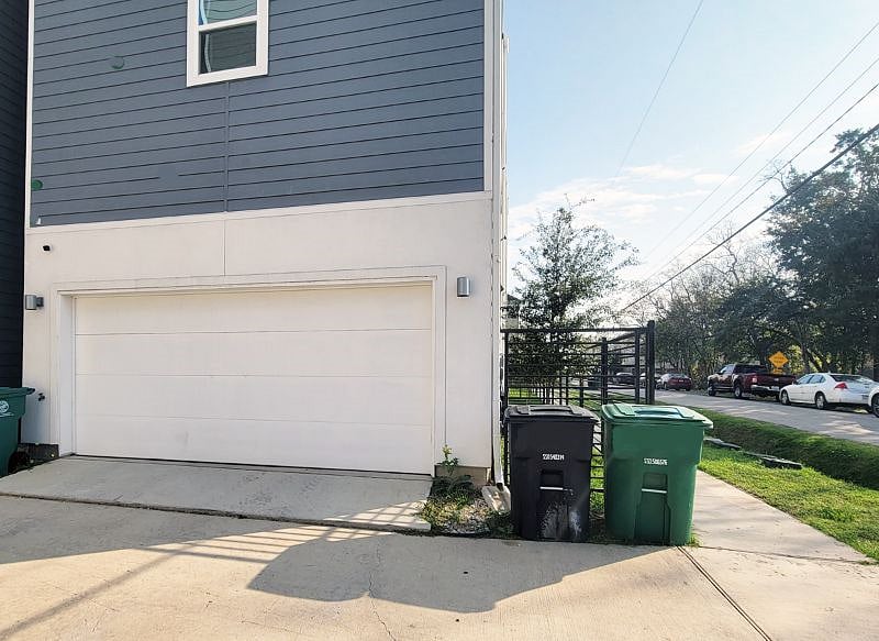 Private 2 car garage with city trash and recycle service available.
