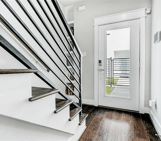 1st floor entrance with front door noted and stairway to 2nd floor.