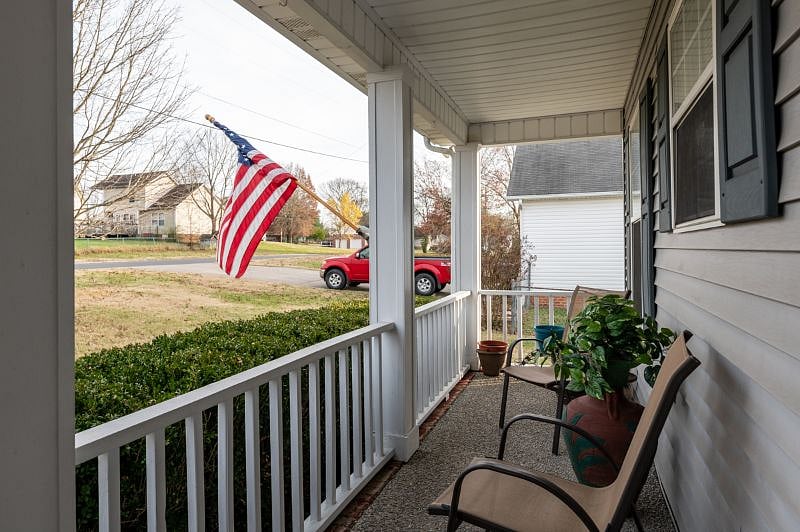 Covered front porch living to relax in the evenings