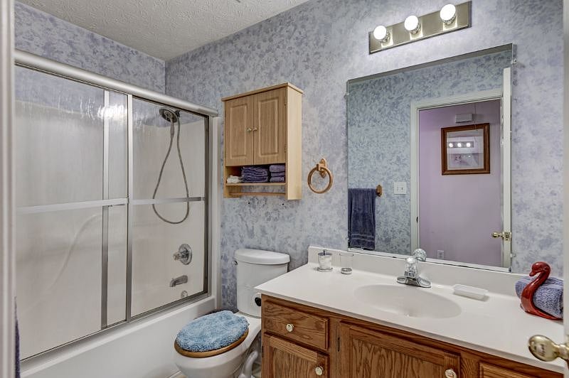 Main bathroom has tub/shower combo and linen closet