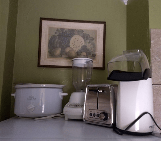 Crook pot, toaster, popcorn popper, and blender